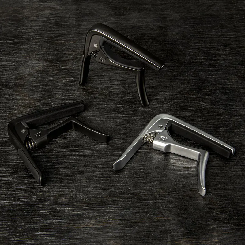 Dunlop 63CBK Trigger Fly Capo for akustisk gitar/elgitar, svart